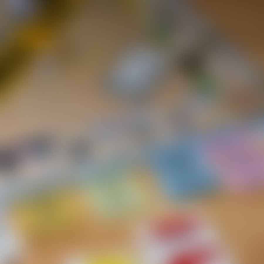 Kids playing Monopoly, Math for Love Prime Climb, Sequence Numbers, Sum Swamp, and Sums in Space board games